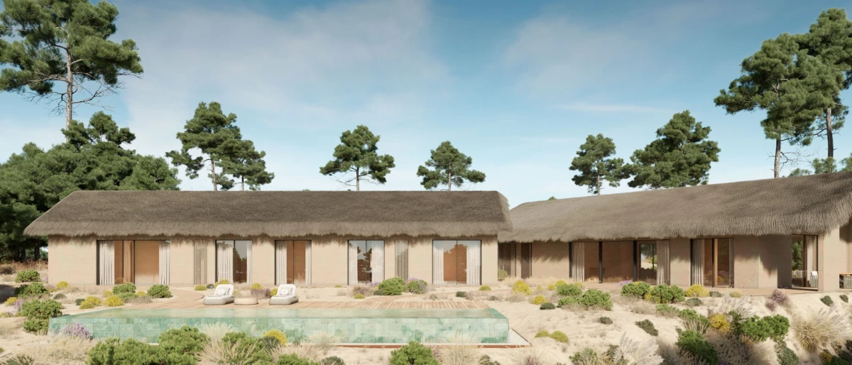 Vista frontal de casa de luxo em Comporta com linhas simples e materiais naturais.