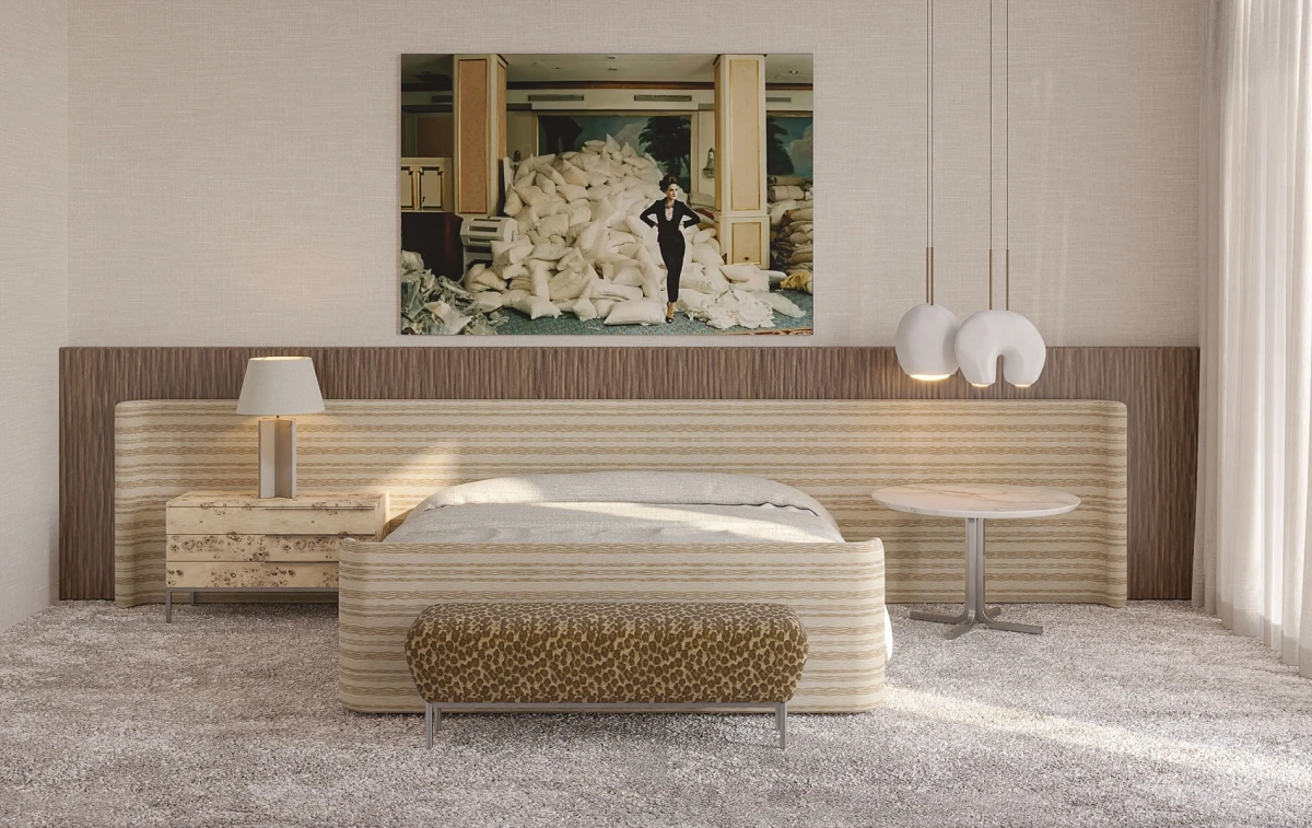 Elegant bedroom with sculptural furniture and contemporary art in luxury residence.