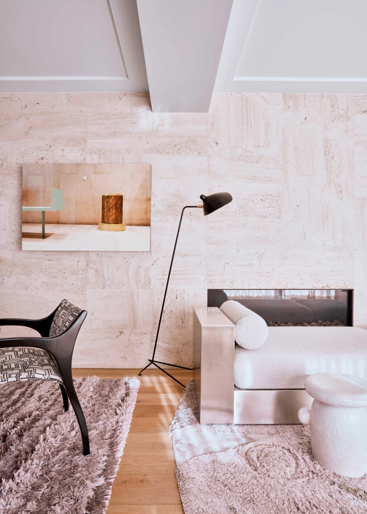 Timeless living room interior with bespoke furniture and sculptural art.
