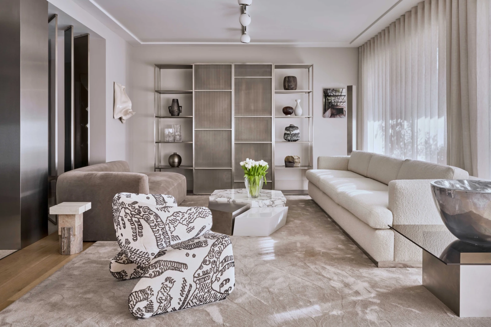 Elegant living room with modern classic furniture and neutral luxury palette.